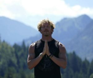 Man standing thoughtfully in a park, showcasing the journey of recovery through Alcohol Detox in Nashville for a healthier future.