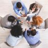 Group of individuals in a support circle participating in a 12 Step Program, focusing on healing and recovery.