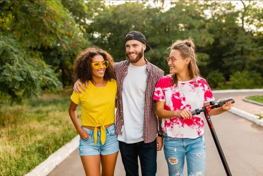 Group of friends walking and smiling together, symbolizing the support and success gained through Alcohol Detox in Nashville programs