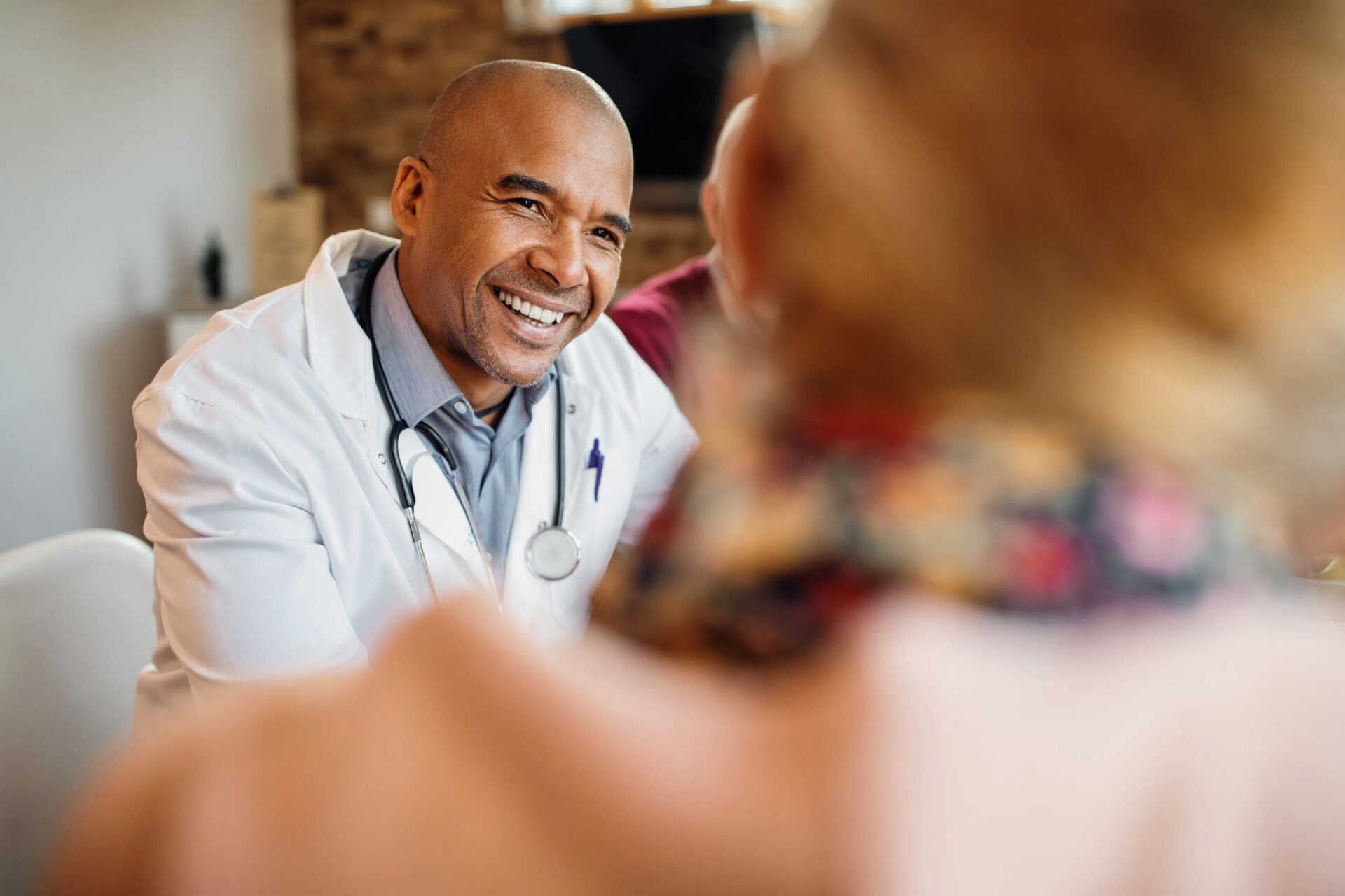 Doctor discussing continued addiction treatment after medical detox